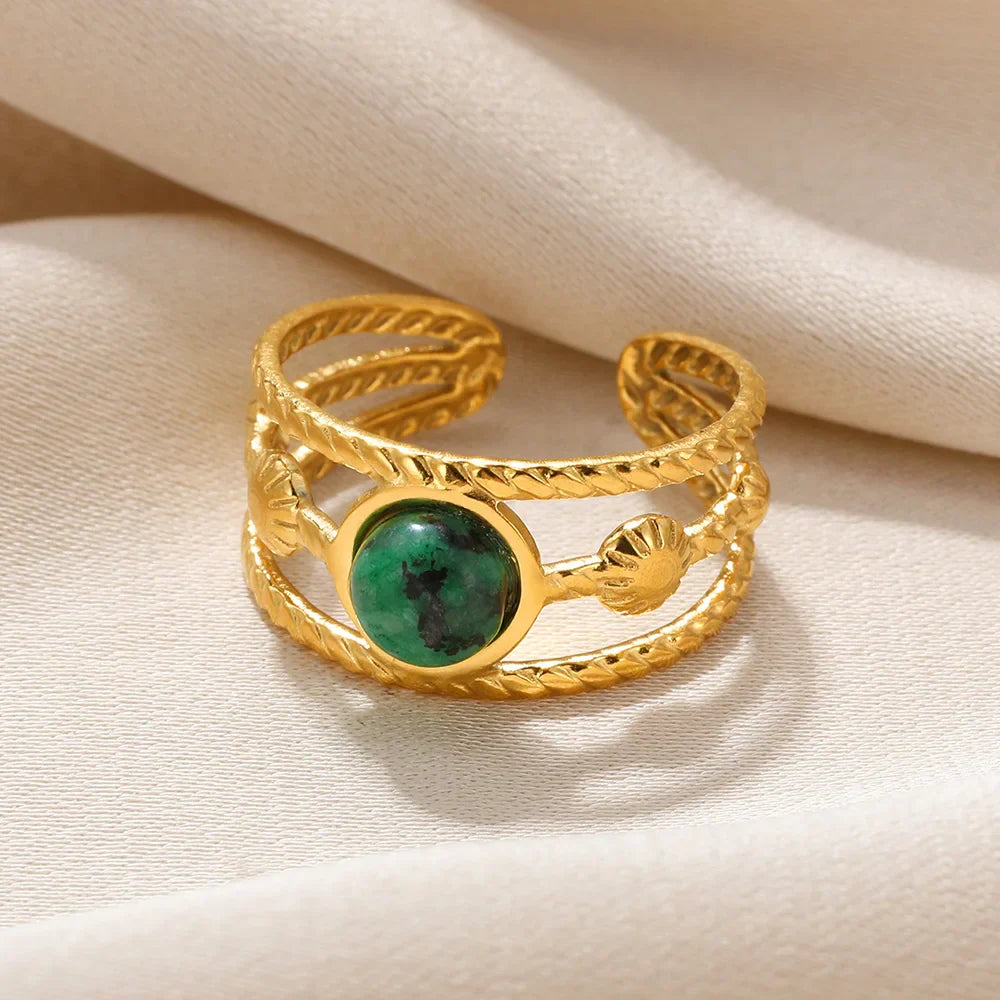 Gold Ring with Green Stone Design