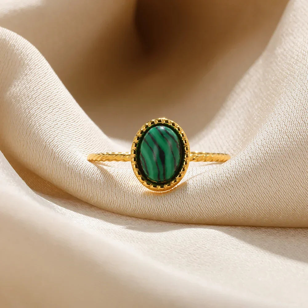 Gold Ring with Green Stone Accent