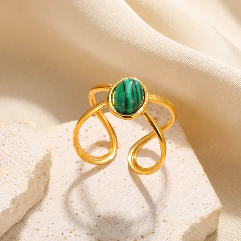 Gold Ring with Green Stone Design