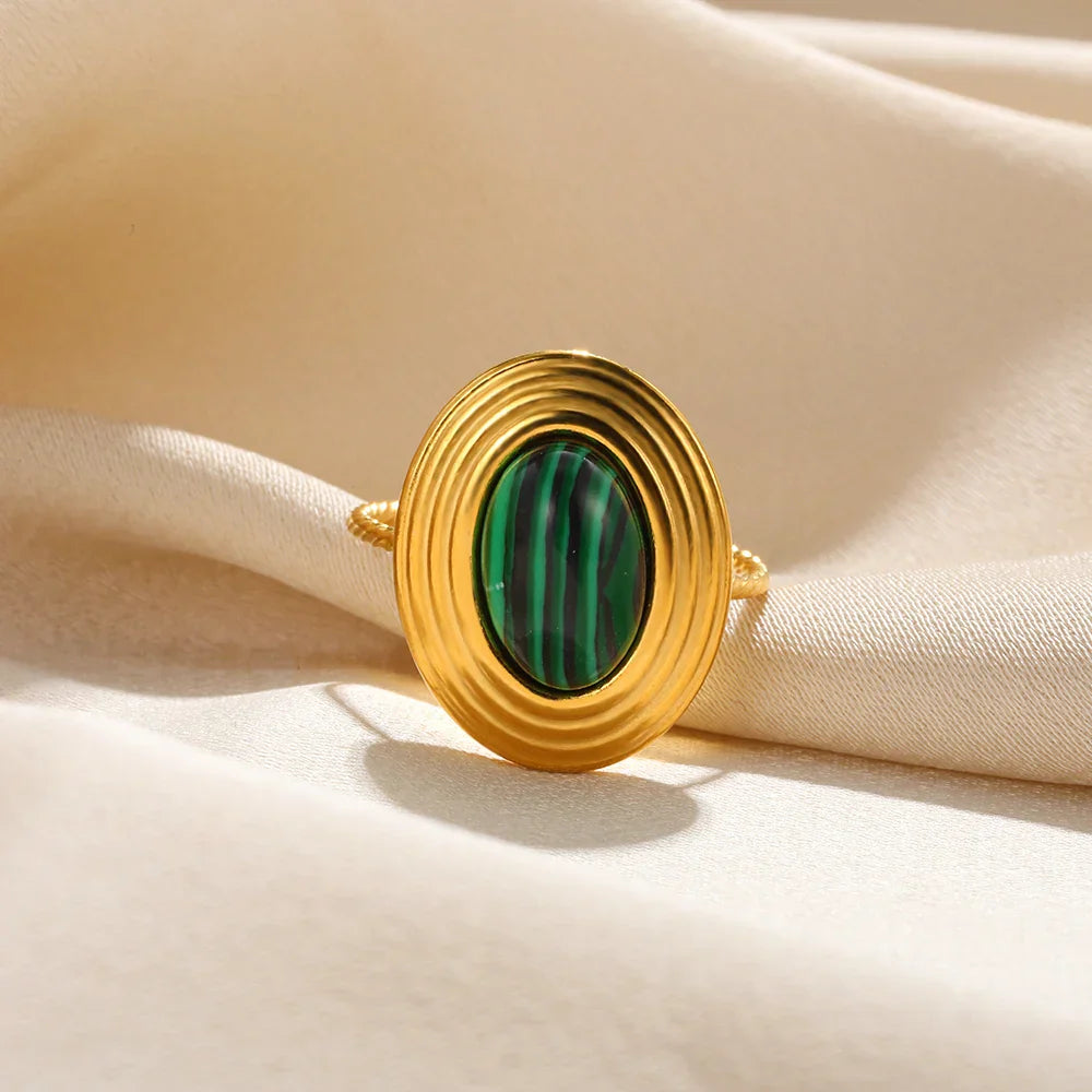 Gold Ring with Green Stone Design