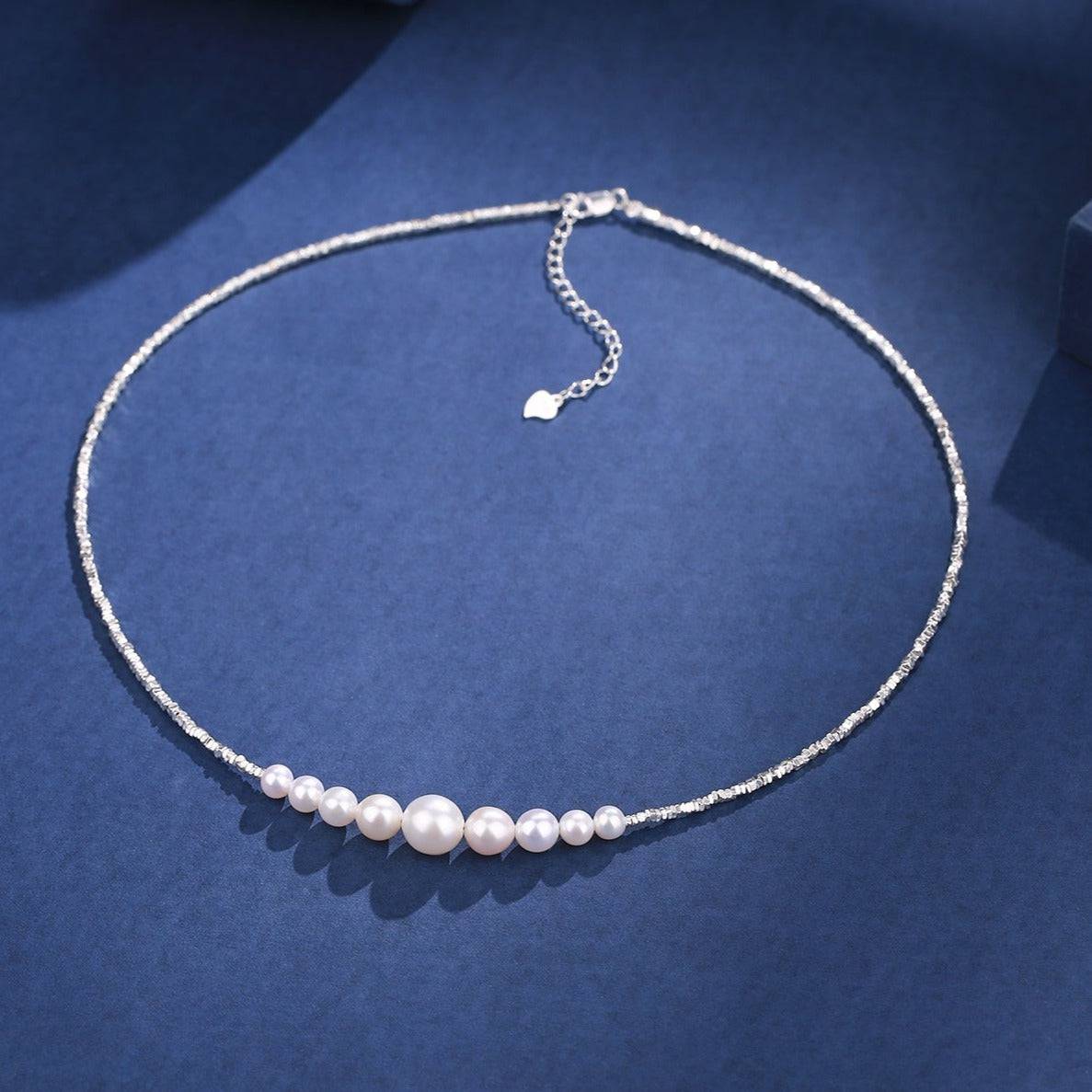 White Pearl Necklace with Silver Shards Design