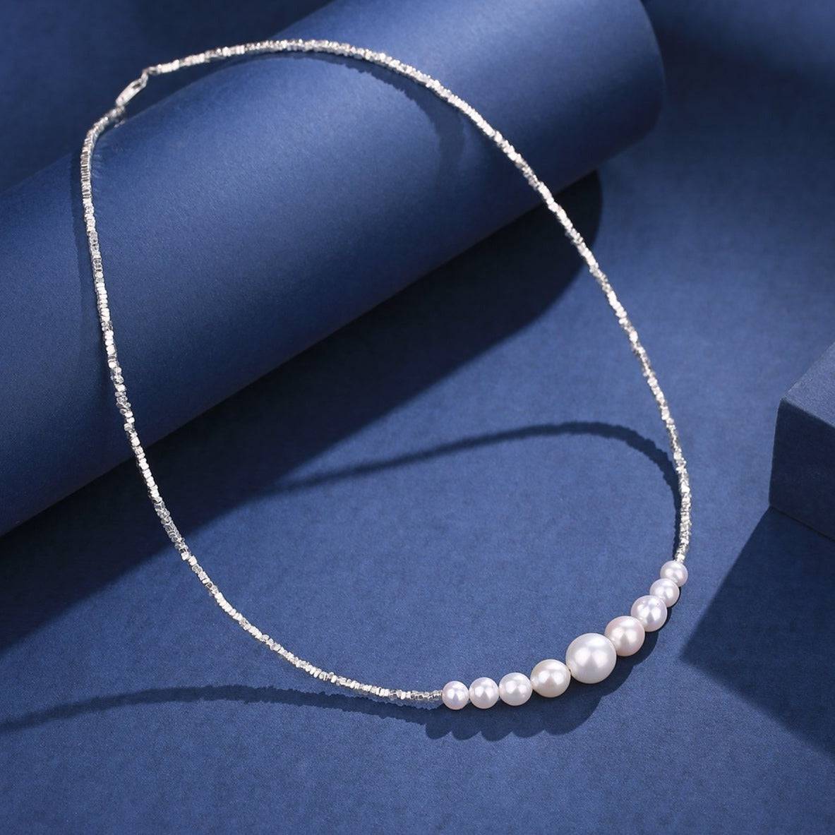 White Pearl Necklace with Silver Shards Design